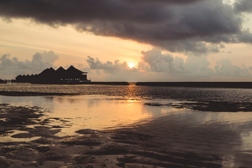 Fototapeta premium Beach at the Maldives at Sunset