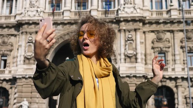 Travel Tourist Woman Smiling Taking Selfie Photo With Smartphone In City.