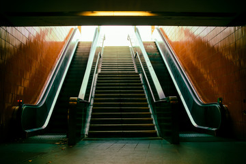 Close-up of the escalator at the metro station. Steps in motion.