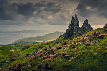 Fototapeta na wymiar Landscape view of Old Man of Storr rock formation, dramatic clouds, Scotland