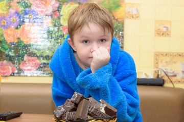 Family in focus: portrait of a happy cute child with food