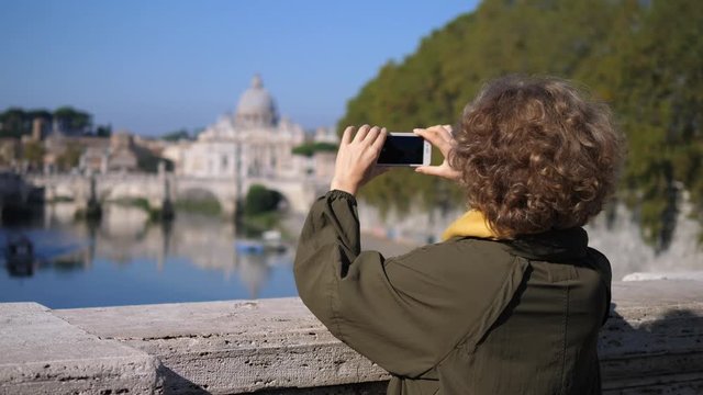 Female Tourist Taking Photo Of Landmark With Smartphone, Travel In Europe