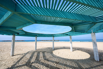Solar canopy on the beach of Mediterranean sea.