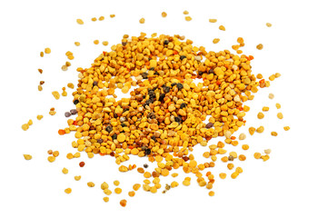 scattered bee pollen on white