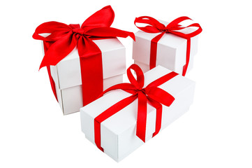 three white gift boxes isolated