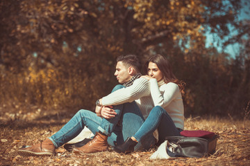 Fototapeta premium Amorous couple enjoying autumn day outdoors