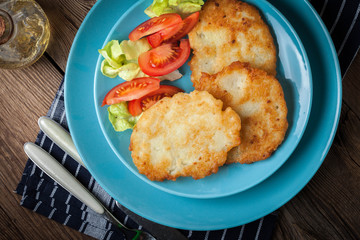 Crispy fried homemade potato pancakes.