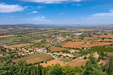 Rural landscape with fields and small towns in Umbria, Italy