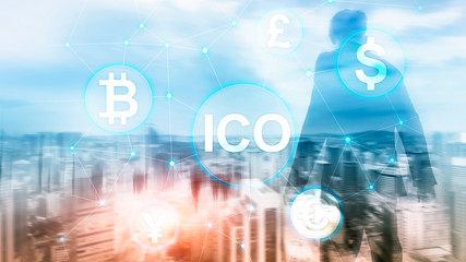 ICO - Initial coin offering, Blockchain and cryptocurrency concept on blurred business building...