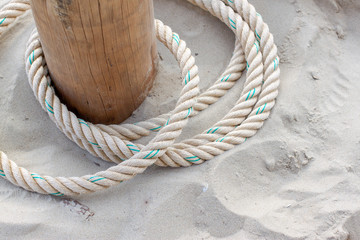 rope on beach with sand