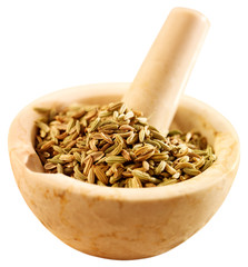 FENNEL SEEDS IN PESTLE AND MORTAR CUT OUT