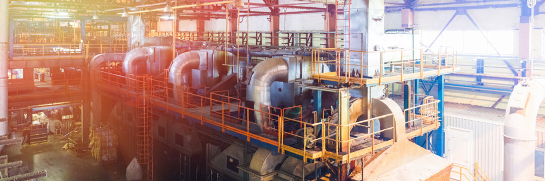 Fiberglass production industry equipment at manufacture background