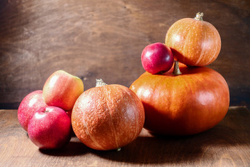 Many pumpkins and apples