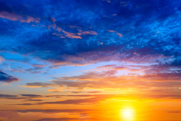 Sunset dramatic sky clouds. Sky with clouds and sun.