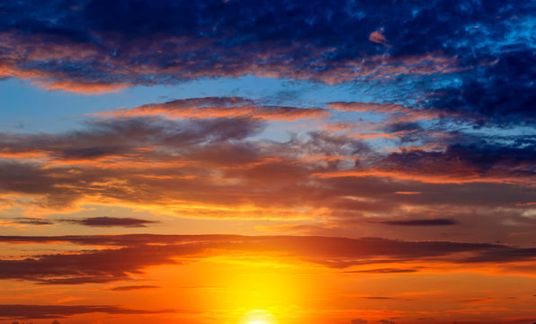 Sunset dramatic sky clouds. Sky with clouds and sun. © sergofan2015