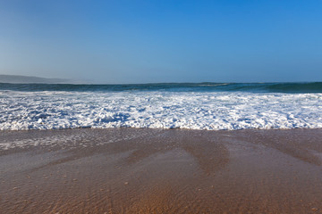 Atlantic ocean coast in morning time next to Nazare, Portugal.
