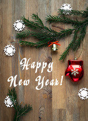 Christmas background with christmas toys and fir tree branches. Copy space.