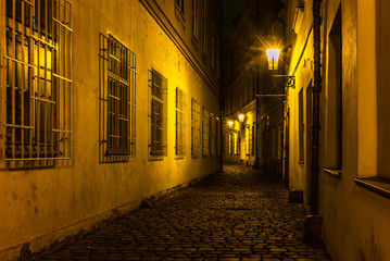 Old cobbled streets and buildings of Prague Old Town at night in Autumn - 4