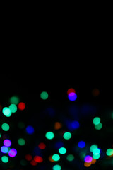 Abstract Multicolors Background. Colorful Abstract Background. Colorful Texture. Blurred Image Of Colorful Lights. Blurred Christmas Lights On Dark Background. Blurred Image.

