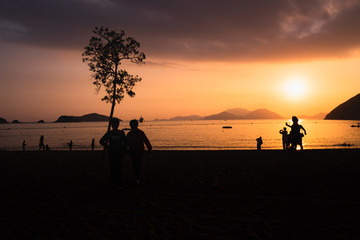 Silhouette of People on Sunset Beach at Repulse bay hong kong