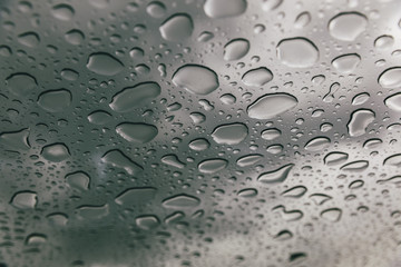 Glass with water in moody day