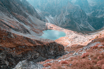 Beautiful blue lake surrounded by high mountains © Bogdan