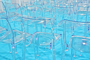 Transparent plastic chairs with copy space