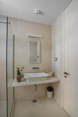 Interior of a bathroom in soft light colours in a luxury villa