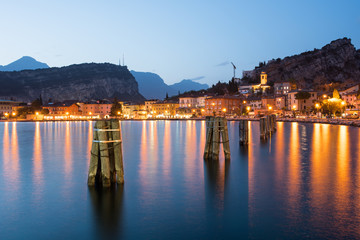 Fototapeta na wymiar Walking along the riverside of Lake Garda, Italy