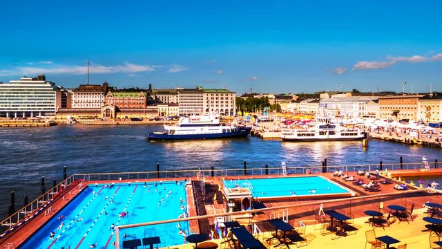 Helsinki, Finland. A timelapse in Helsinki, Finland, with a signature view over the main port and a huge public pool. Time-lapse during the sunny day