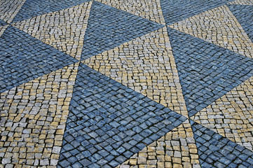 Obraz premium Stone mosaic on the street of Lisbon