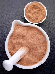 GROUND GINGER IN PESTLE AND MORTAR