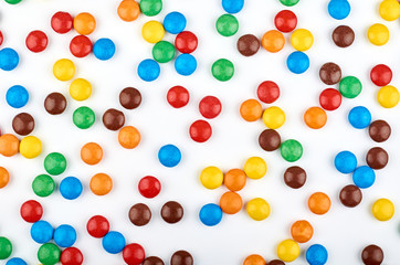 Abstract pattern with round color candy on background. Colorful sweets top view. Flat lay image