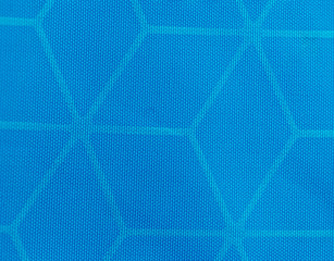 Macro detail view of woven synthetic waterproof blue nylon clothing fabric. Water Resistant Textile...