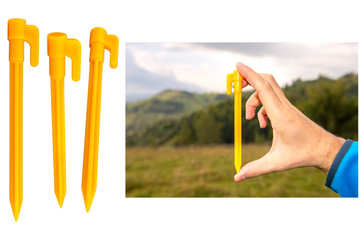 Yellow plastic tent stakes or pegs for camping. Three stakes in different positions and a demo...