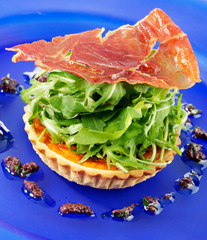RED PEPPER TART WITH ROCKET AND PARMA HAM
