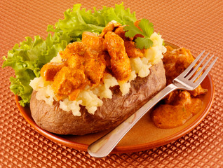 BAKED POTATO WITH CHICKEN TIKKA MASSALA