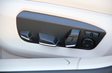 Buttons for adjusting seat position