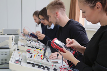Group of young students in technical vocational training with teacher, the lesson in technical...