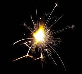 Fototapeta premium Sparkler isolated on black background with clipping path