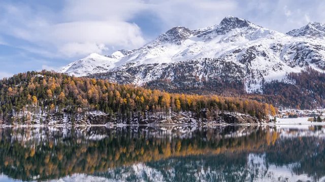 Beautiful reflection of a snow-capped mountain in a lake during the autumn in the Swiss mountains. Filmed with the DJI Inspire 2 drone in 5.2k RAW resolution and downscaled to 4k.