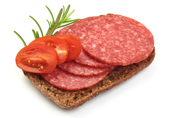 Sandwich with Salami smoked sausage slices and tomatoes, isolated on a white background. Close-up
