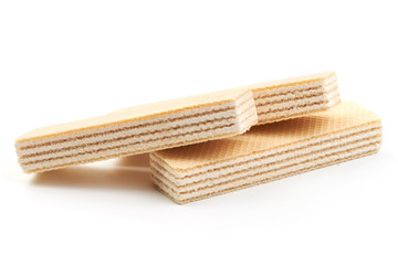 Crunchy vanilla waffles, isolated on a white background. Close-up.