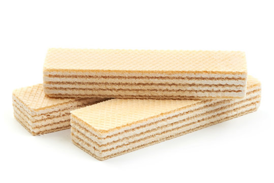Crunchy vanilla waffles, isolated on a white background. Close-up.