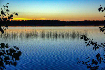 Sunset on the lake every minute changes the color scheme