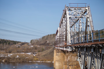railway crossing over the bridge close-up in spring