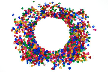 Colorful confetti scattered on white background. Place for text. Copy space.