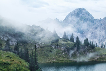 morning fog over alpine peaks