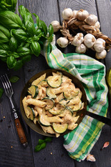 Fototapeta premium Penne pasta witch chicken and zucchini in cheese sauce