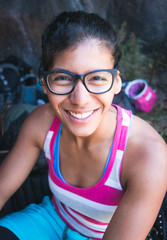 Portrait of beautiful female climber outdoors